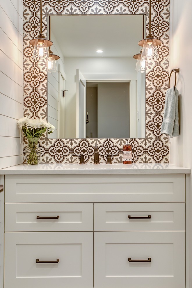 This is an example of a medium sized traditional bathroom in Calgary with shaker cabinets, white cabinets, black and white tiles, cement tiles, white walls, a submerged sink and quartz worktops.
