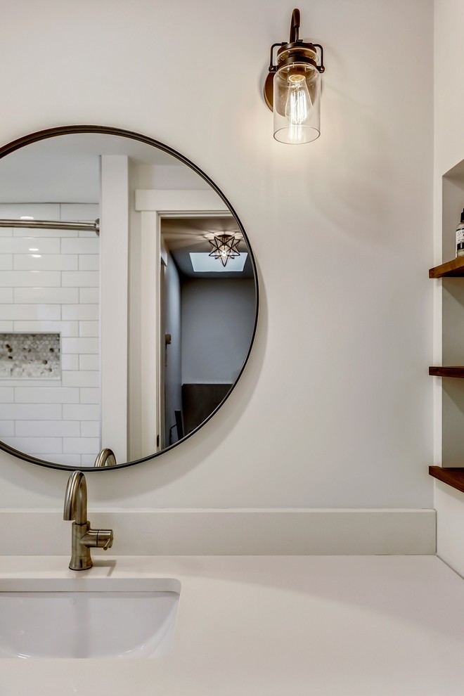 Inspiration for a medium sized classic family bathroom in Calgary with shaker cabinets, white cabinets, an alcove bath, a shower/bath combination, a two-piece toilet, white tiles, porcelain tiles, white walls, porcelain flooring, a submerged sink, quartz worktops, grey floors and a shower curtain.