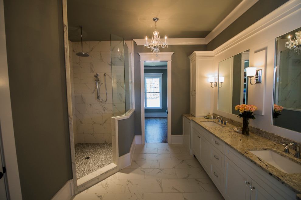 Example of a mid-sized classic doorless shower design in Atlanta with shaker cabinets, white cabinets and granite countertops
