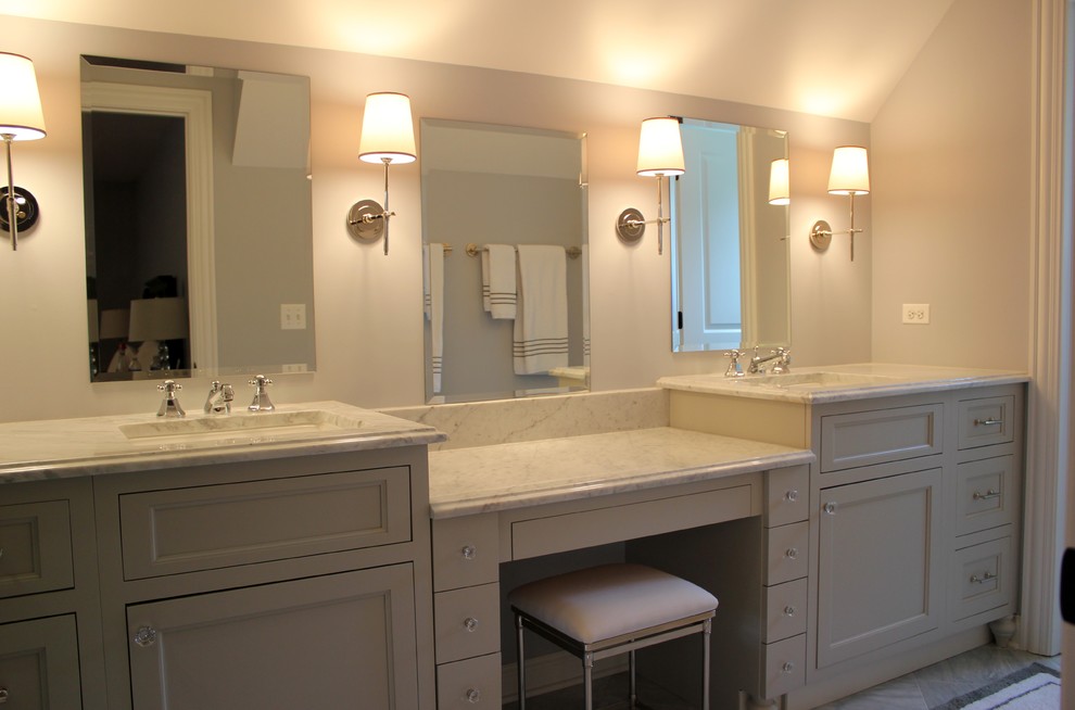 Inspiration for a mid-sized transitional master gray tile and stone tile marble floor, white floor and double-sink alcove shower remodel in Chicago with an undermount sink, gray cabinets, marble countertops, a two-piece toilet, gray walls, recessed-panel cabinets, a hinged shower door, white countertops and a built-in vanity