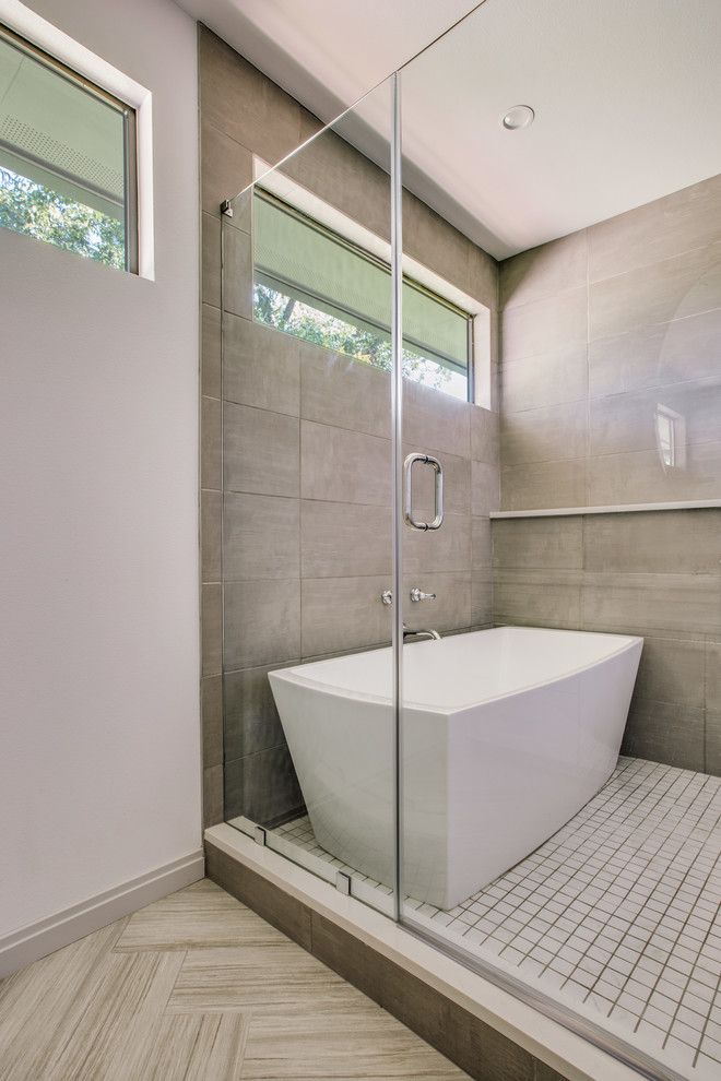 Medium sized traditional ensuite wet room bathroom in Dallas with a freestanding bath, grey tiles, porcelain tiles, white walls, porcelain flooring, white floors and a hinged door.