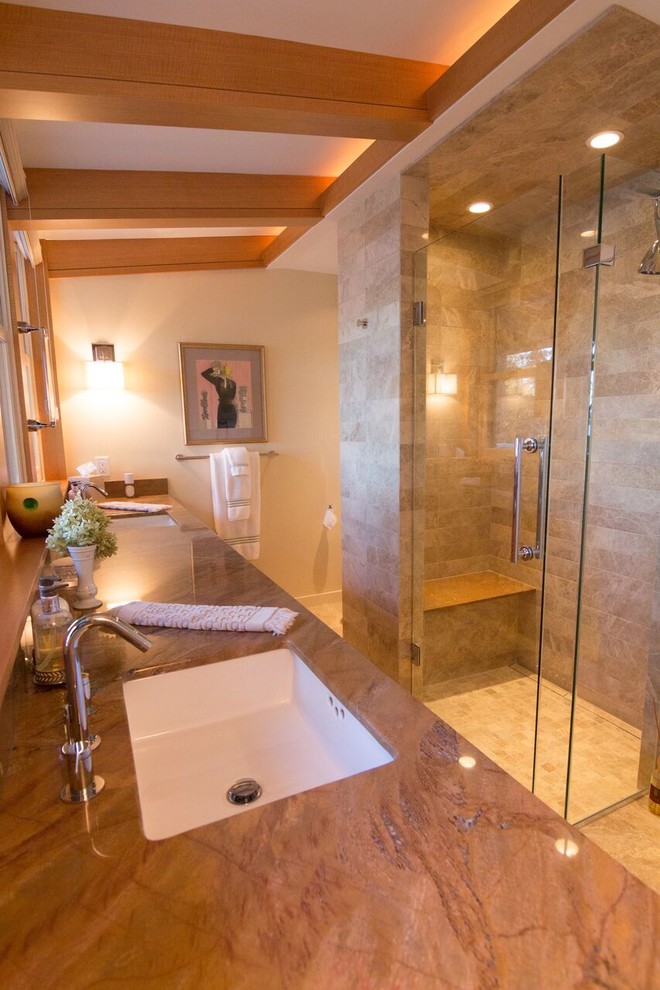 Design ideas for a contemporary shower room bathroom in Minneapolis with flat-panel cabinets, light wood cabinets, a built-in shower, a one-piece toilet, beige tiles, stone slabs, beige walls, travertine flooring, a submerged sink and granite worktops.