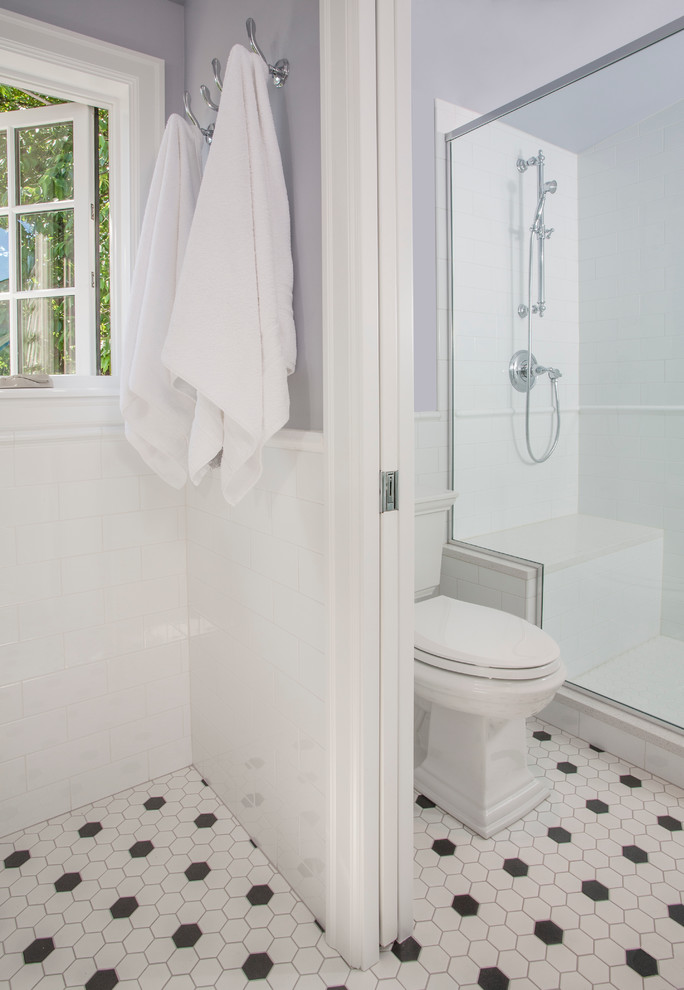 Medium sized classic shower room bathroom in Seattle with shaker cabinets, white cabinets, a double shower, a two-piece toilet, white tiles, ceramic tiles, purple walls, ceramic flooring, a submerged sink and engineered stone worktops.