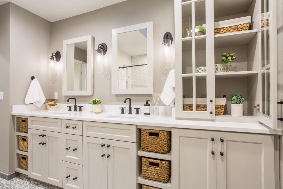 Example of a mid-sized beach style kids' white tile and ceramic tile porcelain tile and gray floor bathroom design in Seattle with shaker cabinets, gray cabinets, a one-piece toilet, gray walls, an undermount sink, quartz countertops and white countertops