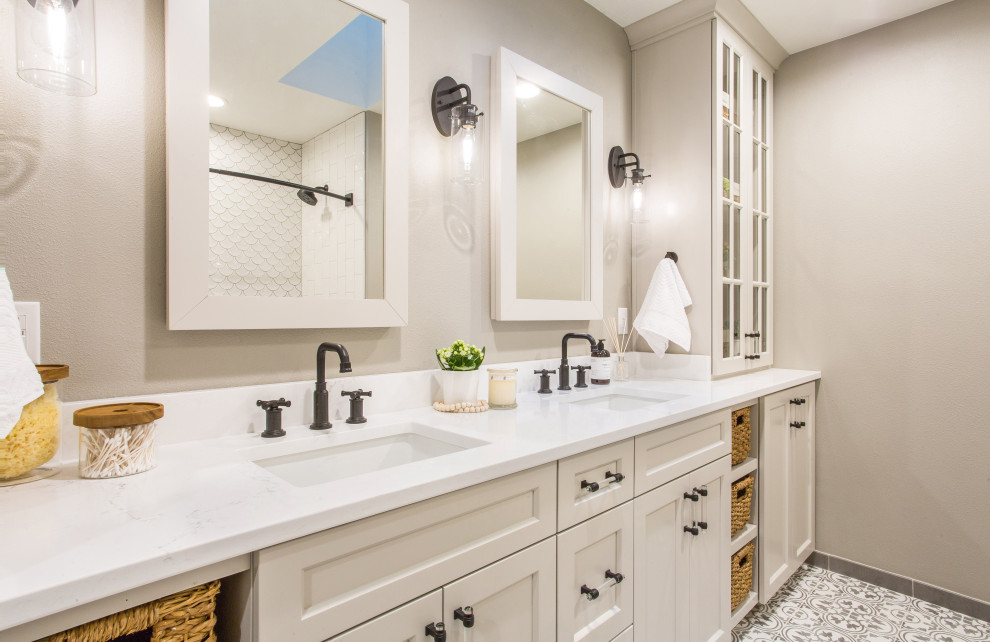Medium sized coastal bathroom in Seattle with shaker cabinets, white tiles, grey walls, porcelain flooring, a submerged sink, engineered stone worktops, grey floors, white worktops, beige cabinets, double sinks and a built in vanity unit.