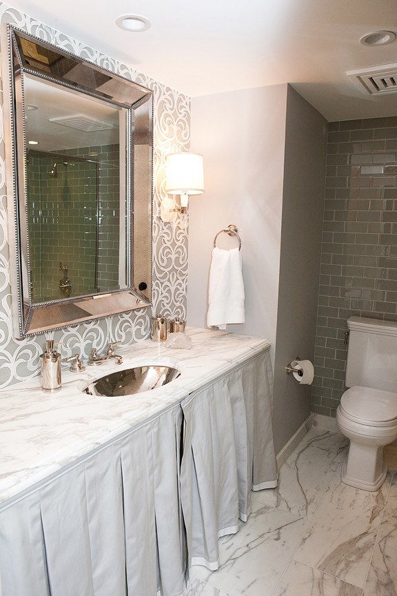 Photo of a medium sized modern bathroom in Chicago with a submerged sink, grey tiles and glass tiles.