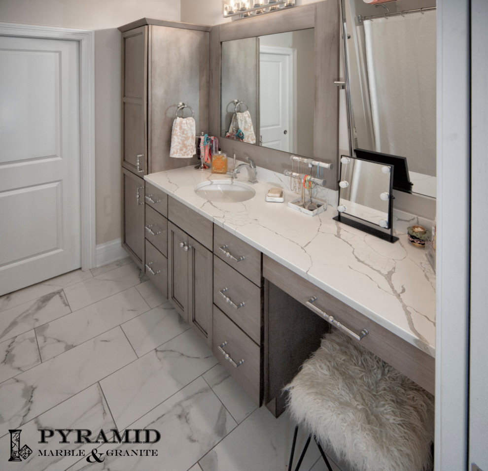 Inspiration for a medium sized traditional family bathroom in Chicago with grey cabinets, grey walls, porcelain flooring, a submerged sink, engineered stone worktops, white floors and white worktops.
