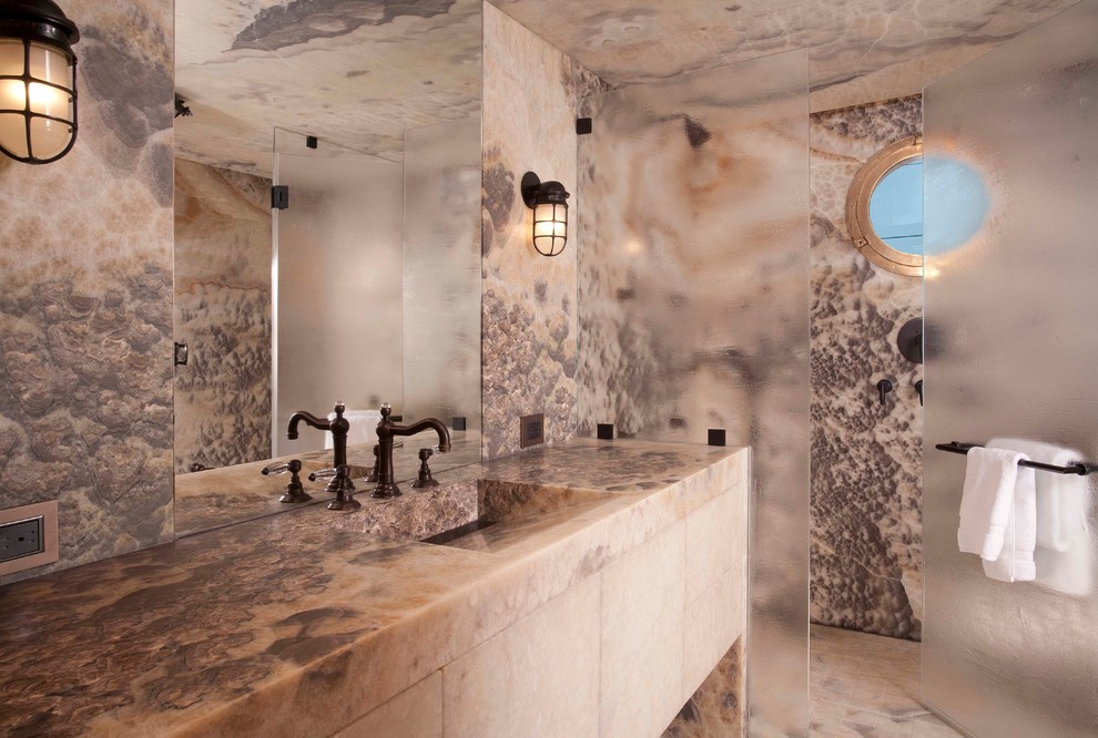 Example of a trendy walk-in shower design in Seattle with an integrated sink
