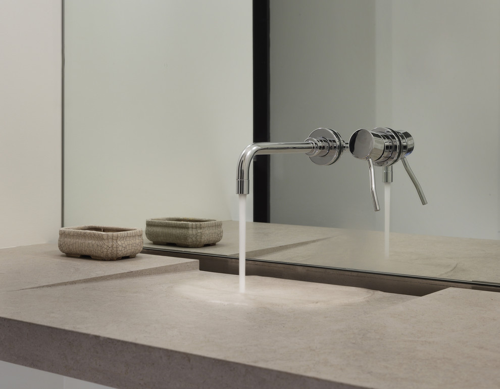 Diseño de cuarto de baño minimalista con lavabo integrado