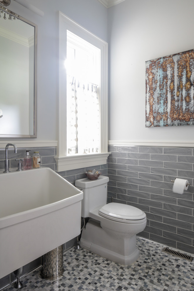 Bathroom - mid-sized traditional master gray tile and marble tile mosaic tile floor bathroom idea in New York with open cabinets, a one-piece toilet, gray walls, an integrated sink and white countertops