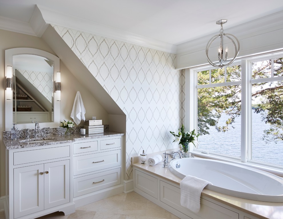 Пример оригинального дизайна: ванная комната среднего размера в стиле неоклассика (современная классика) с душевой кабиной, фасадами в стиле шейкер, белыми фасадами, накладной ванной, врезной раковиной и серой столешницей