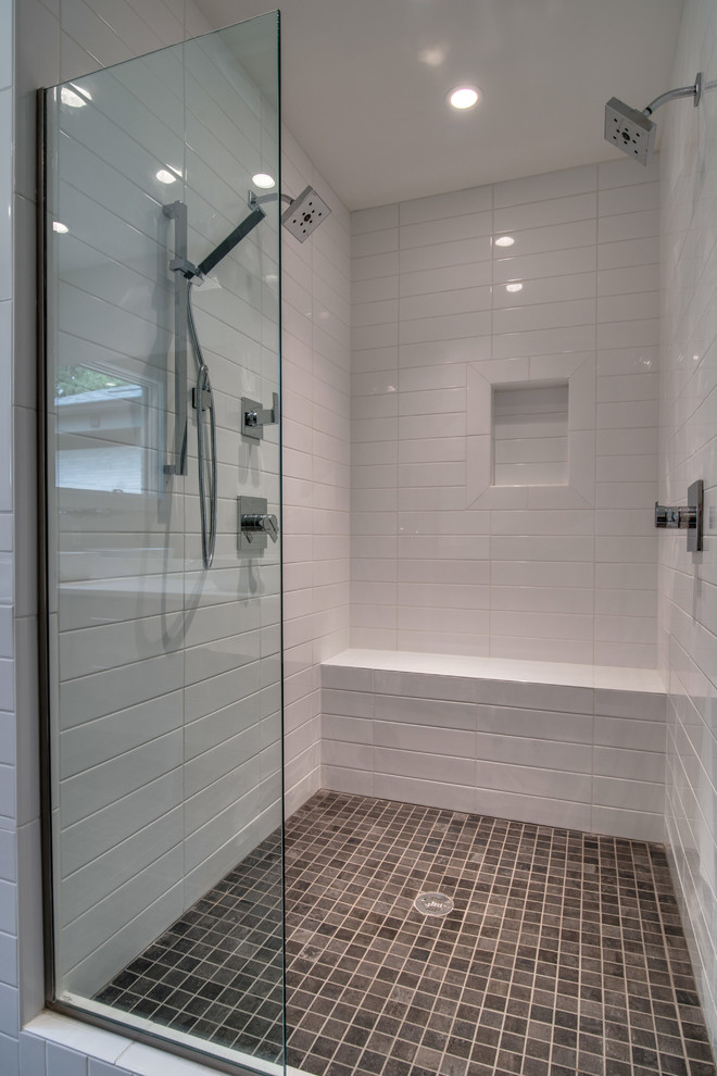 Inspiration for a mid-sized coastal master white tile and porcelain tile porcelain tile doorless shower remodel in Nashville with a vessel sink, flat-panel cabinets, medium tone wood cabinets, quartzite countertops, a two-piece toilet and gray walls