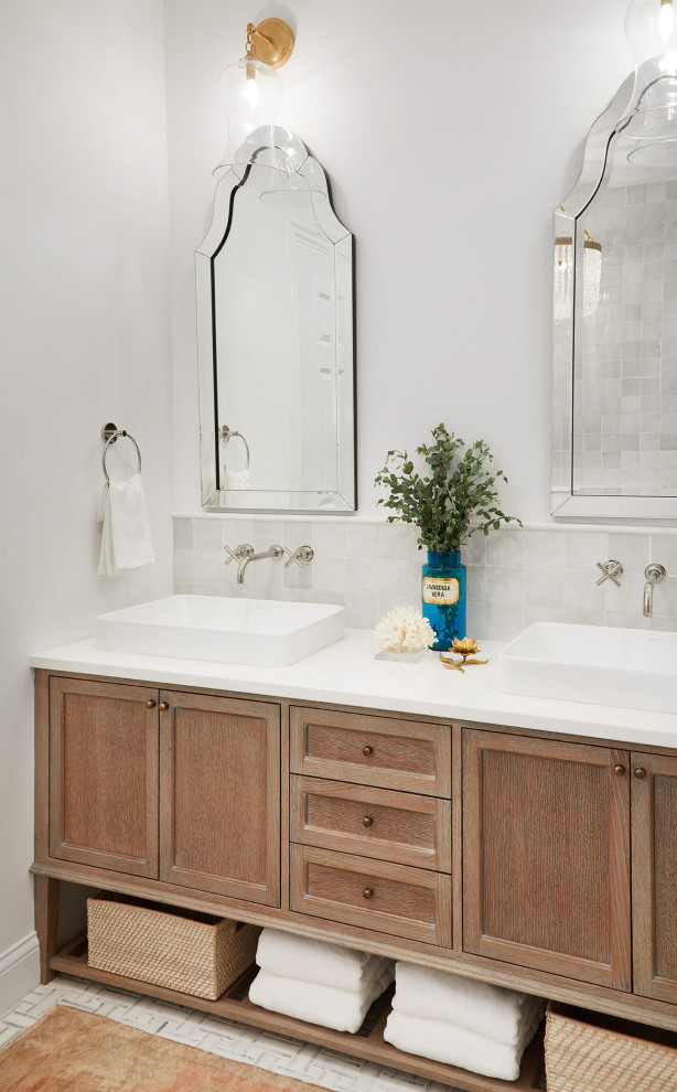 Bathroom - mid-sized eclectic master white tile and terra-cotta tile marble floor and white floor bathroom idea in Chicago with furniture-like cabinets, distressed cabinets, a one-piece toilet, white walls, a vessel sink, quartz countertops and white countertops