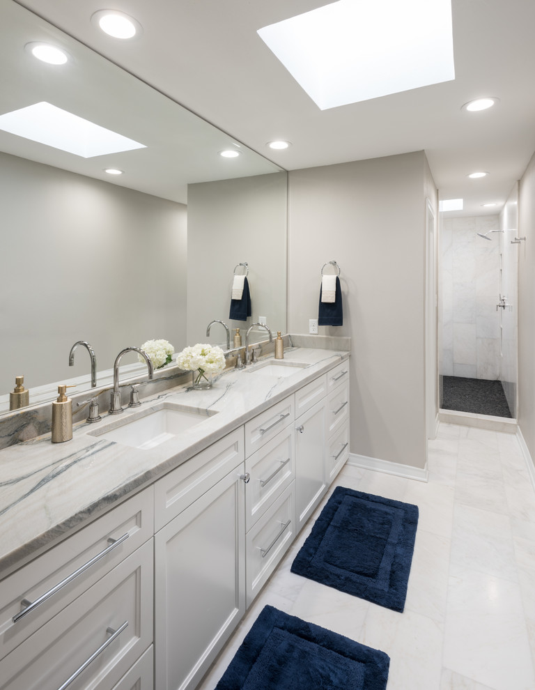 Photo of a large classic ensuite bathroom in Dallas with shaker cabinets, white cabinets, a walk-in shower, a one-piece toilet, white tiles, marble tiles, grey walls, marble flooring, a submerged sink, marble worktops, white floors and an open shower.