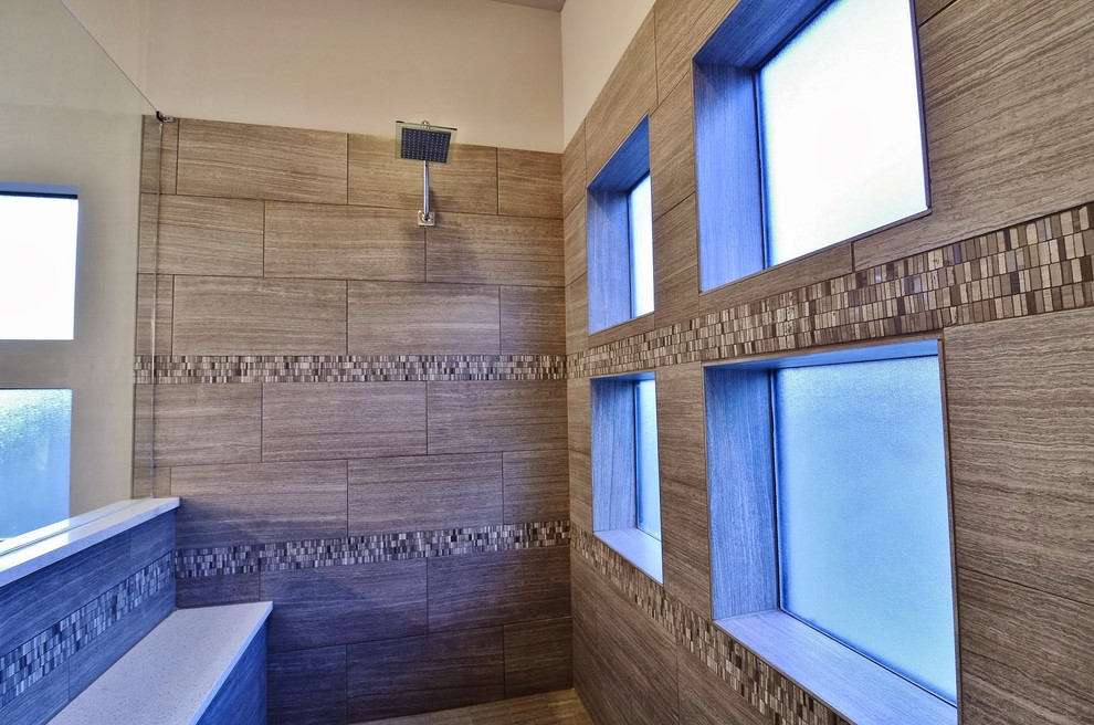 This is an example of a medium sized contemporary bathroom in Dallas with a corner shower, brown tiles, porcelain tiles, brown walls and a hinged door.