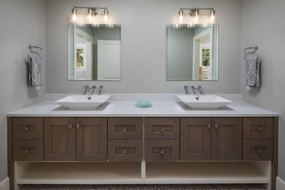 Bathroom - large transitional kids' mosaic tile floor, white floor and double-sink bathroom idea in Grand Rapids with recessed-panel cabinets, dark wood cabinets, a two-piece toilet, gray walls, a vessel sink, quartzite countertops, white countertops and a built-in vanity