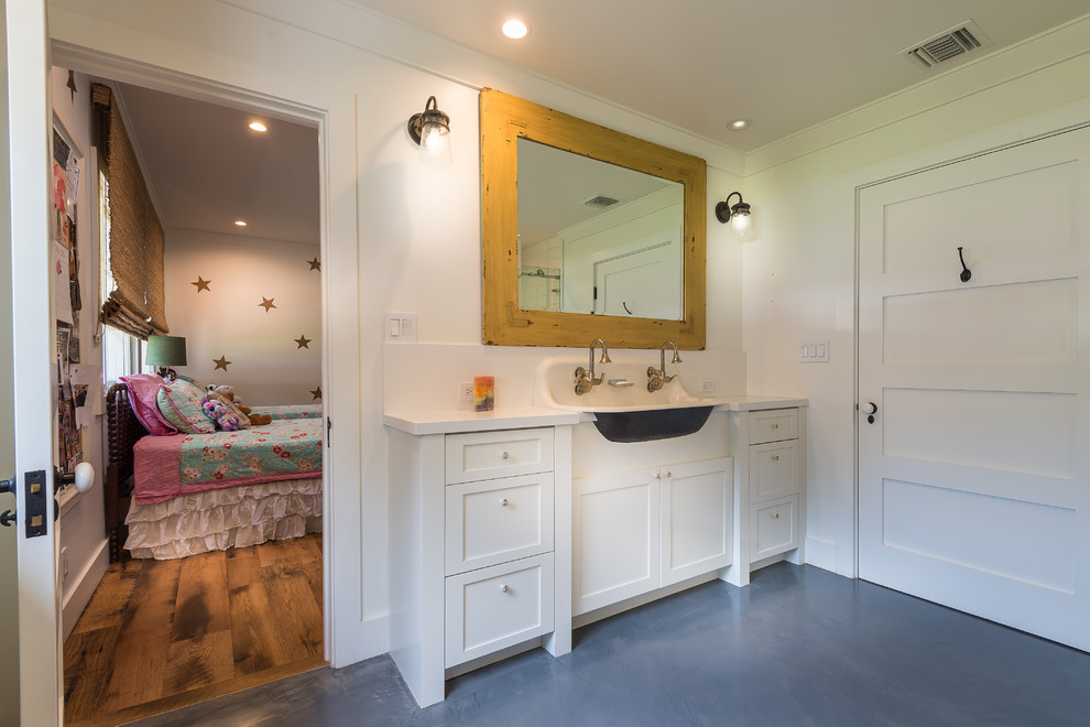 This is an example of a medium sized rural shower room bathroom in Los Angeles with an alcove shower, white tiles, ceramic tiles, white walls, concrete flooring and a trough sink.