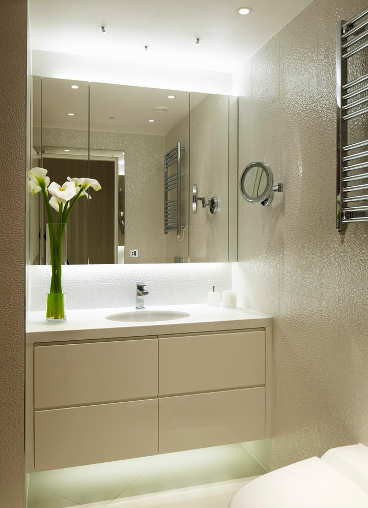 Inspiration for a contemporary bathroom in London with feature lighting.