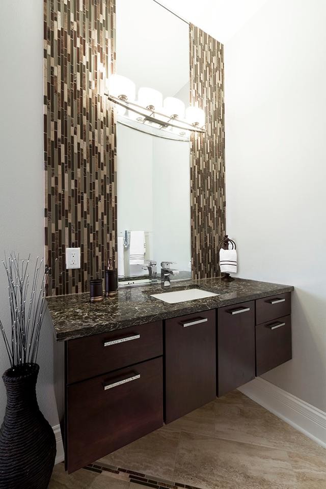 Inspiration for a medium sized contemporary ensuite bathroom in Milwaukee with flat-panel cabinets, medium wood cabinets, beige tiles, brown tiles, matchstick tiles, white walls, travertine flooring, a submerged sink, granite worktops and beige floors.