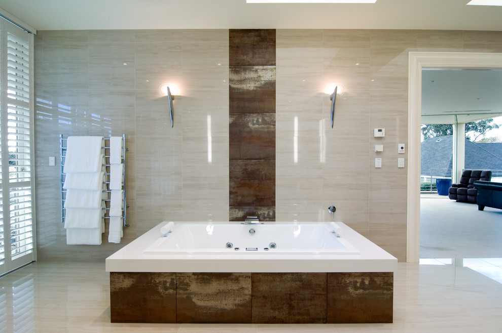 Drop-in bathtub - modern brown tile drop-in bathtub idea in Melbourne