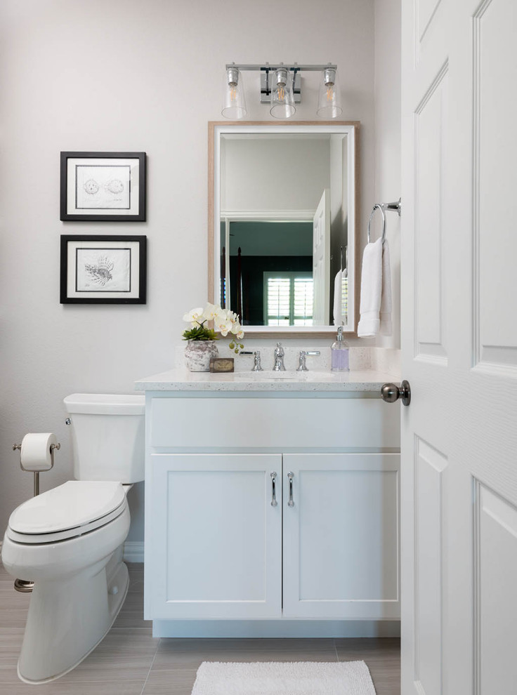 This is an example of a shower room bathroom in Dallas with white cabinets, a one-piece toilet, beige floors, white worktops, a single sink and a built in vanity unit.