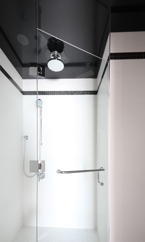 Design ideas for a small modern shower room bathroom in Toronto with an alcove shower, flat-panel cabinets, black cabinets, granite worktops and white walls.