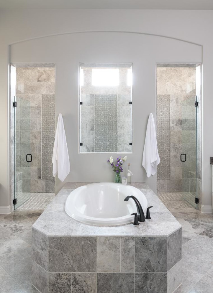 Transitional gray floor bathroom photo in Dallas with gray walls and a hinged shower door