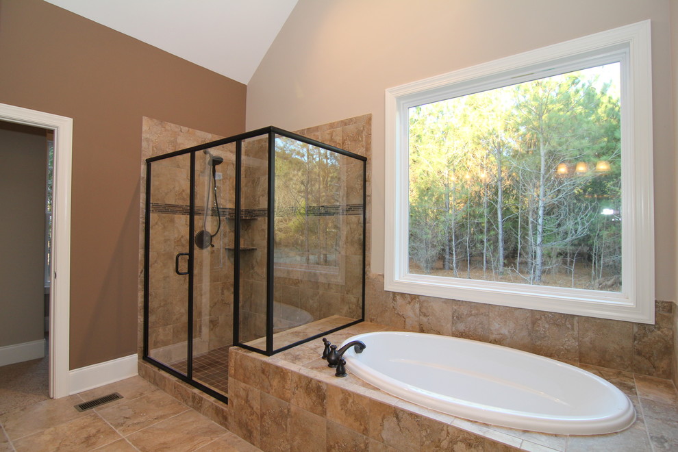 Design ideas for a large classic ensuite bathroom in Raleigh with an integrated sink, recessed-panel cabinets, white cabinets, solid surface worktops, a corner bath, a corner shower, a one-piece toilet, beige tiles, ceramic tiles, brown walls and ceramic flooring.