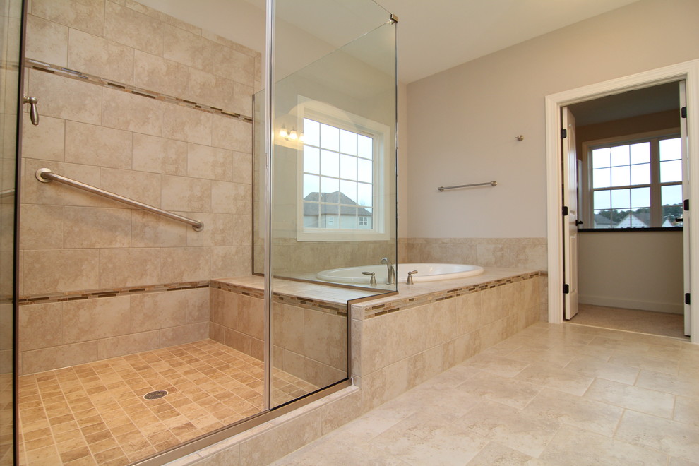 Large elegant master beige tile and ceramic tile ceramic tile bathroom photo in Raleigh with recessed-panel cabinets, white cabinets, a one-piece toilet and beige walls