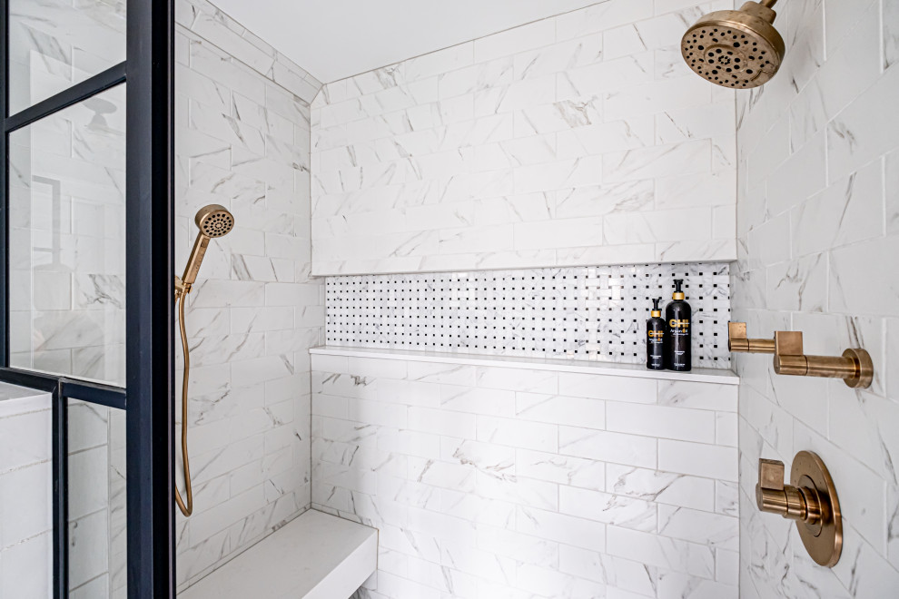 Medium sized modern ensuite bathroom in Newark with flat-panel cabinets, black cabinets, an alcove shower, a two-piece toilet, white tiles, marble flooring, a submerged sink, engineered stone worktops, white floors, a hinged door, white worktops, a wall niche, double sinks and a built in vanity unit.