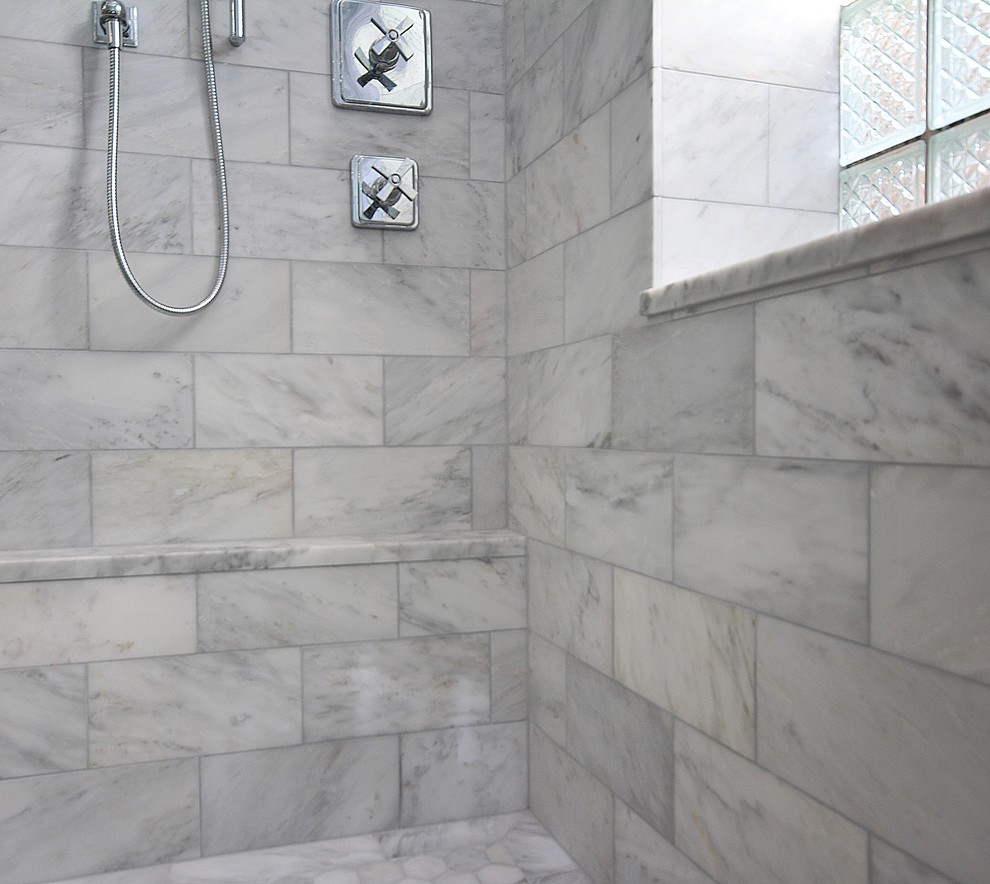 Alcove shower - large traditional master gray tile and stone tile medium tone wood floor alcove shower idea in Chicago with an undermount sink, raised-panel cabinets, white cabinets, marble countertops, a two-piece toilet and green walls