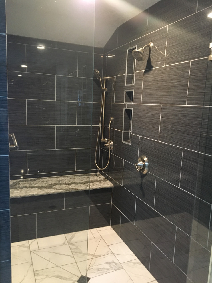 Large contemporary ensuite bathroom in Seattle with a built-in shower, black tiles, porcelain tiles, porcelain flooring, engineered stone worktops and white floors.
