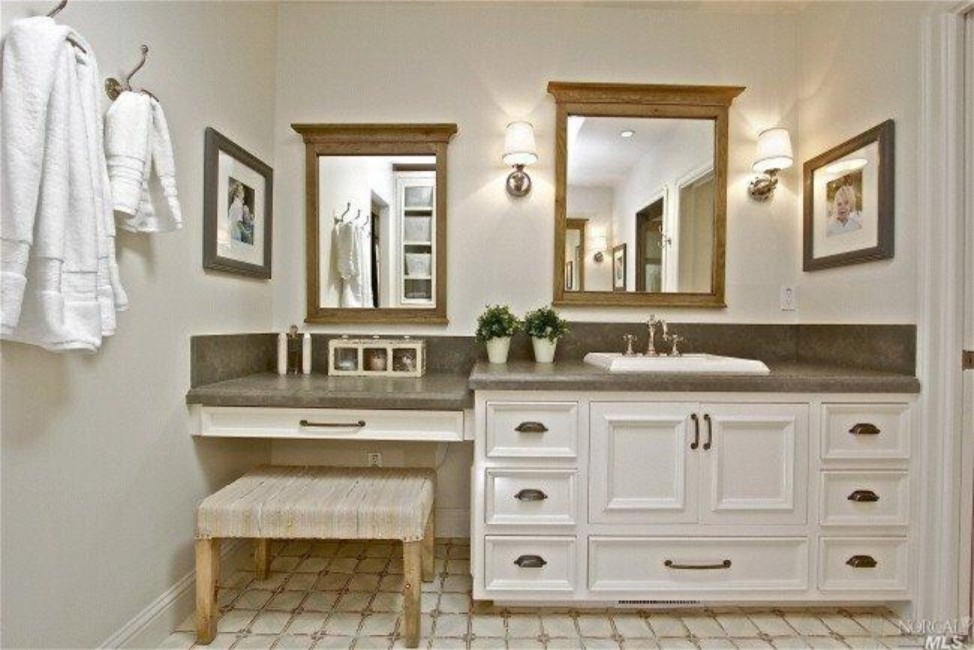 Bathroom - mid-sized transitional master blue tile and porcelain tile ceramic tile bathroom idea in San Francisco with raised-panel cabinets, white cabinets, a one-piece toilet, blue walls, a drop-in sink and tile countertops
