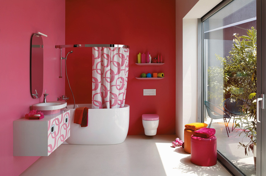 Источник вдохновения для домашнего уюта: главная ванная комната среднего размера в современном стиле с плоскими фасадами, белыми фасадами, накладной ванной, душем над ванной, инсталляцией, розовыми стенами, бетонным полом, настольной раковиной и столешницей из искусственного камня