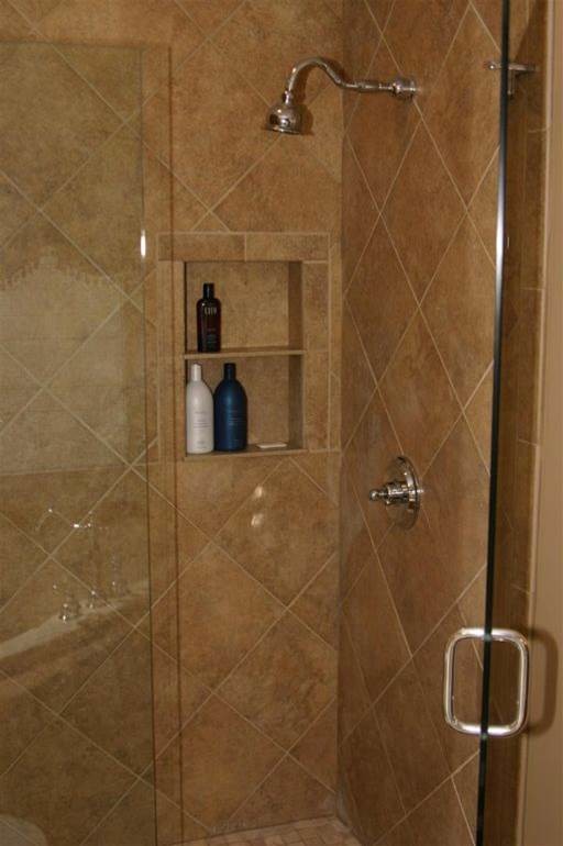 Large elegant master beige tile and ceramic tile ceramic tile bathroom photo in Other with beige walls, raised-panel cabinets, medium tone wood cabinets, a one-piece toilet, an undermount sink and quartzite countertops