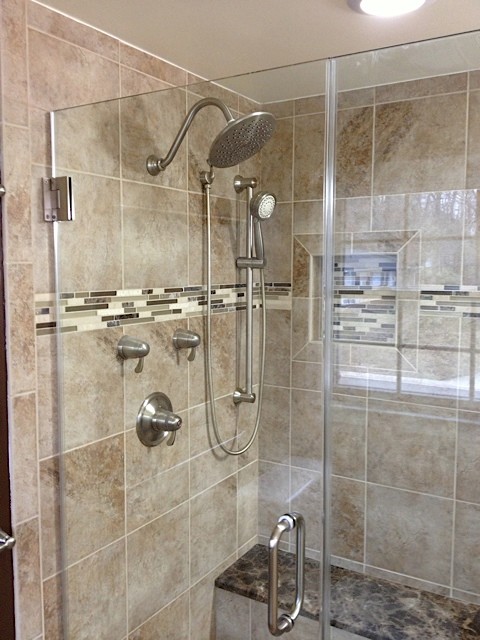 Photo of a medium sized classic ensuite bathroom in DC Metro with raised-panel cabinets, white cabinets, an alcove shower, a two-piece toilet, beige tiles, matchstick tiles, beige walls, ceramic flooring, a submerged sink and marble worktops.