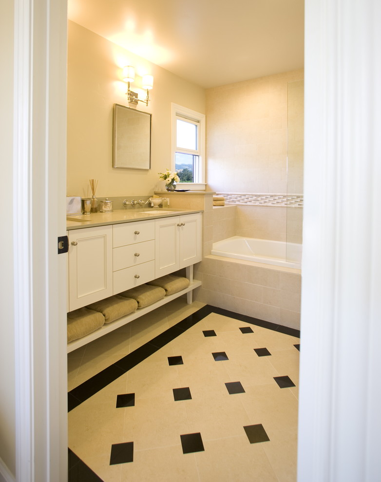 Design ideas for a medium sized farmhouse ensuite bathroom in San Francisco with beaded cabinets, white cabinets, a built-in bath, a shower/bath combination, beige walls, a submerged sink, beige floors and an open shower.