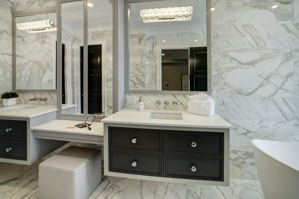 Design ideas for a large traditional ensuite bathroom in Toronto with a freestanding bath, a built-in shower, white tiles, porcelain tiles, a submerged sink and a hinged door.