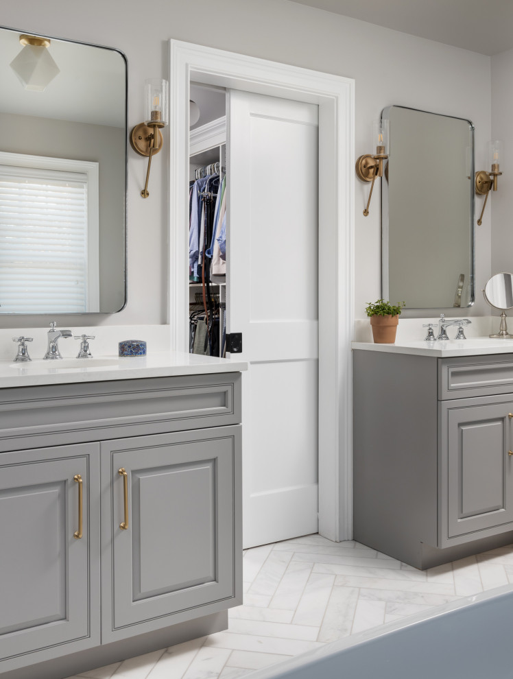 Small traditional ensuite bathroom in New York with beaded cabinets, grey cabinets, a freestanding bath, an alcove shower, a two-piece toilet, white tiles, marble tiles, grey walls, marble flooring, a built-in sink, engineered stone worktops, white floors, a hinged door and white worktops.