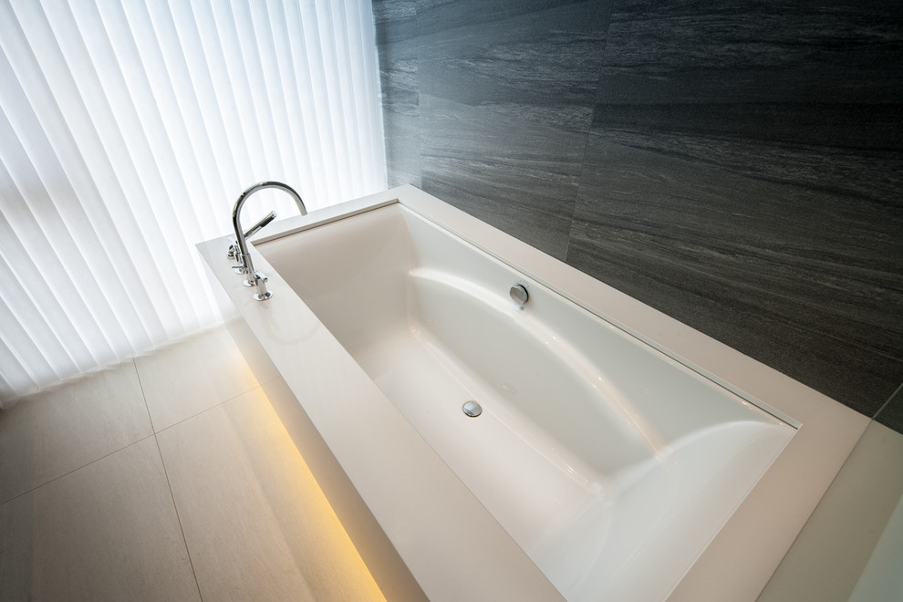 Example of a trendy master white tile and porcelain tile porcelain tile bathroom design in Toronto with a vessel sink, flat-panel cabinets, medium tone wood cabinets, quartz countertops and white walls
