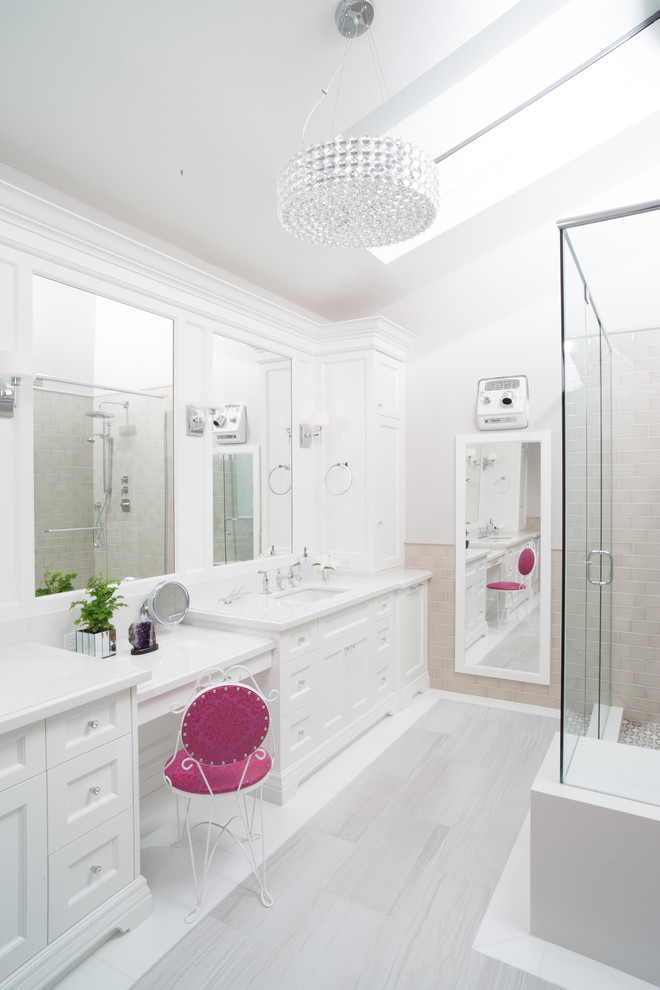 Bathroom - transitional master beige tile bathroom idea in Toronto with an undermount sink, white cabinets, white walls and white countertops