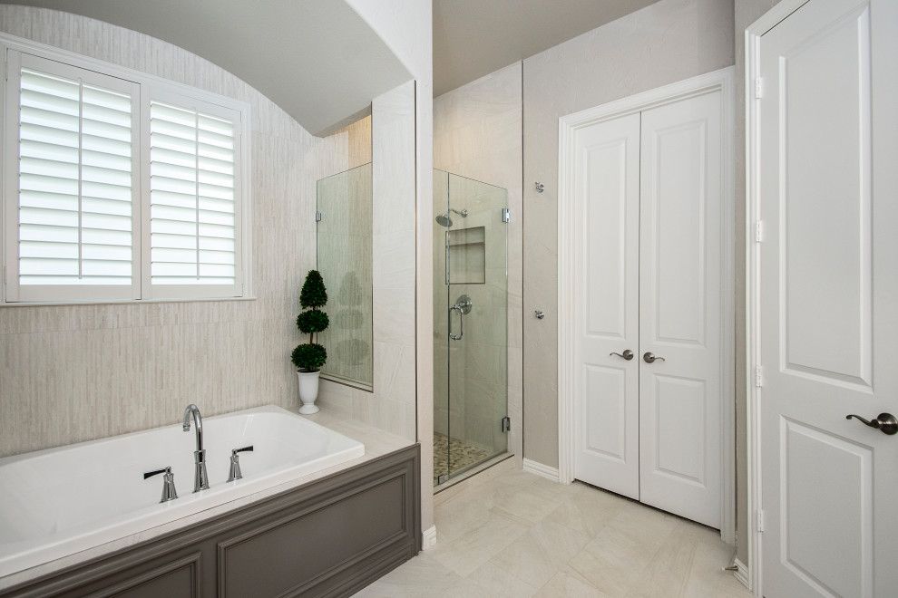 Inspiration for a medium sized classic ensuite bathroom in Dallas with raised-panel cabinets, grey cabinets, a built-in bath, a corner shower, a two-piece toilet, grey tiles, porcelain tiles, grey walls, porcelain flooring, a submerged sink, engineered stone worktops, grey floors, a hinged door, white worktops, double sinks and a built in vanity unit.