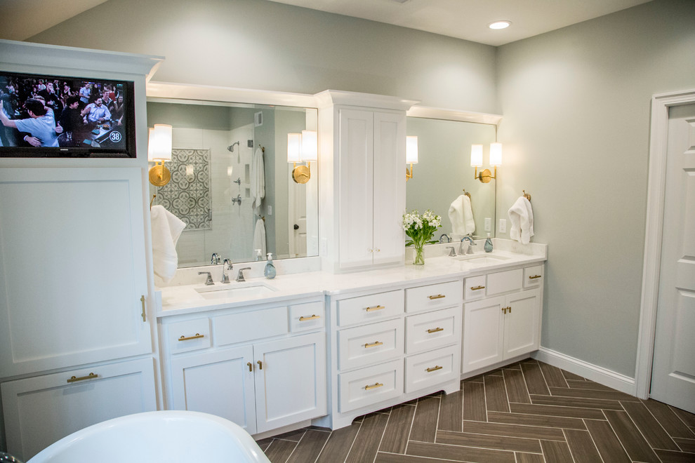 Bathroom - mid-sized transitional master white tile and ceramic tile porcelain tile bathroom idea in Kansas City with shaker cabinets, white cabinets, a two-piece toilet, green walls, an undermount sink and quartz countertops