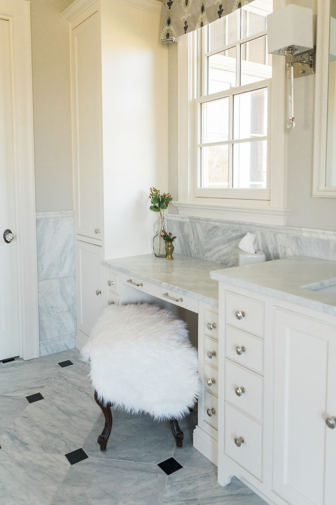 Example of a large classic master gray tile and marble tile marble floor and gray floor bathroom design in Nashville with beaded inset cabinets, white cabinets, a one-piece toilet, gray walls, an undermount sink and marble countertops