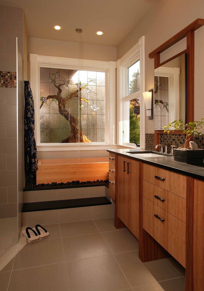 Design ideas for a world-inspired bathroom in Seattle with mosaic tiles.