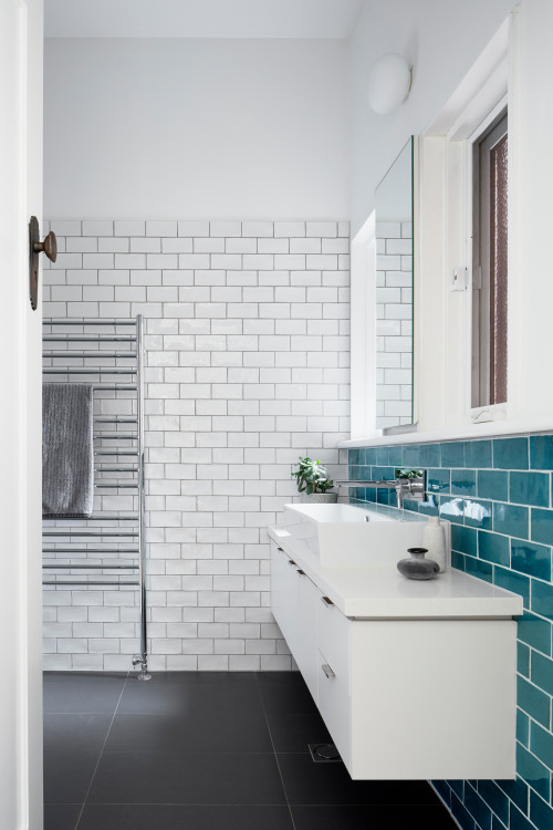 Blue Subway Tile Bathroom Backsplash with White Floating Vanity