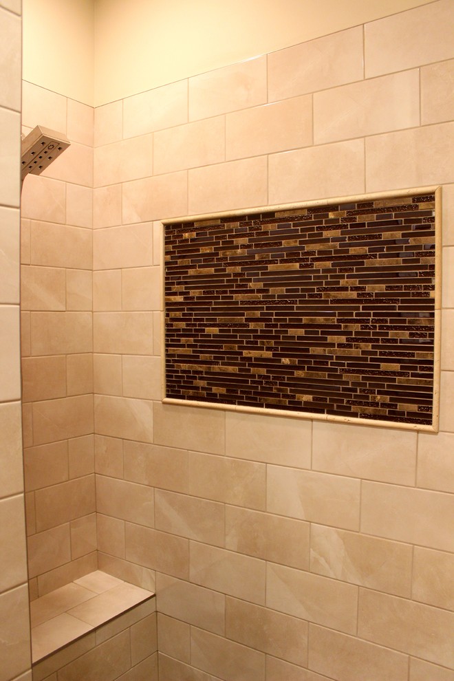 Inspiration for a small modern 3/4 brown tile and mosaic tile vinyl floor corner shower remodel in Calgary with shaker cabinets, medium tone wood cabinets, a one-piece toilet, beige walls, a drop-in sink and laminate countertops