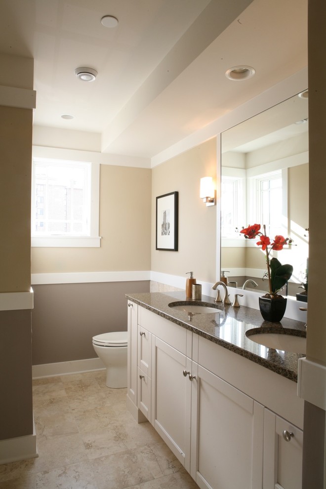 Bathroom - traditional bathroom idea in Chicago with an undermount sink, shaker cabinets and white cabinets