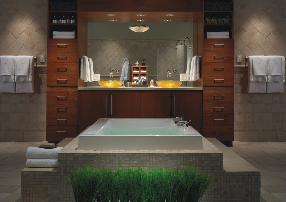 Photo of an ensuite bathroom in Nashville with a pedestal sink, flat-panel cabinets, medium wood cabinets, a japanese bath and ceramic flooring.