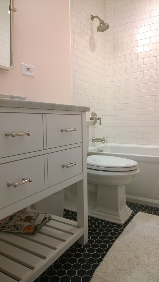 Inspiration for a small traditional family bathroom in Chicago with a submerged sink, freestanding cabinets, white cabinets, quartz worktops, an alcove bath, a shower/bath combination, a two-piece toilet, white tiles, ceramic tiles, pink walls and porcelain flooring.